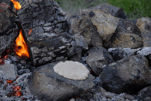 Quinn and Moore added malted barley to water that had been heated in their fulacht fiadh by stones fired on a nearby hearth