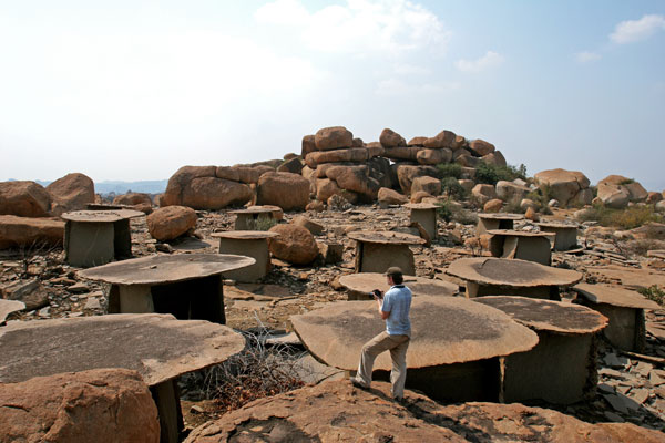 Andrew Bauer surveys the central portion of Hire Benakal, a megalithic site in Karnataka, India, featuring scores of slab-supported tombs with walls and capstones weighing 10 tons or more. The enigmatic monuments are memorials, probably tombs, though no human remains have yet been found at the site. (Samir S. Patel)