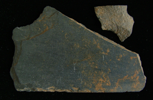 A fragment of a writing slate