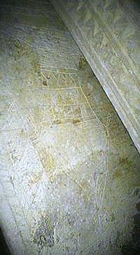 inscribed image on one of two ossuaries